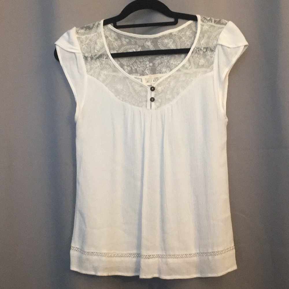Flowy white top with lace and button detailing